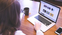 Woman on laptop building a website